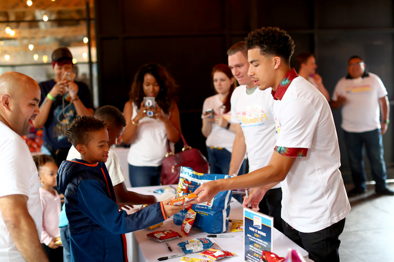 Actor Marcus Scribner joined Frito-Lay Variety Packs and Feed the Children in Los Angeles on Aug. 7, 2019, to kick off its Snackable Notes program to help end childhood hunger by surprising families at a back-to-school meal drive event.
